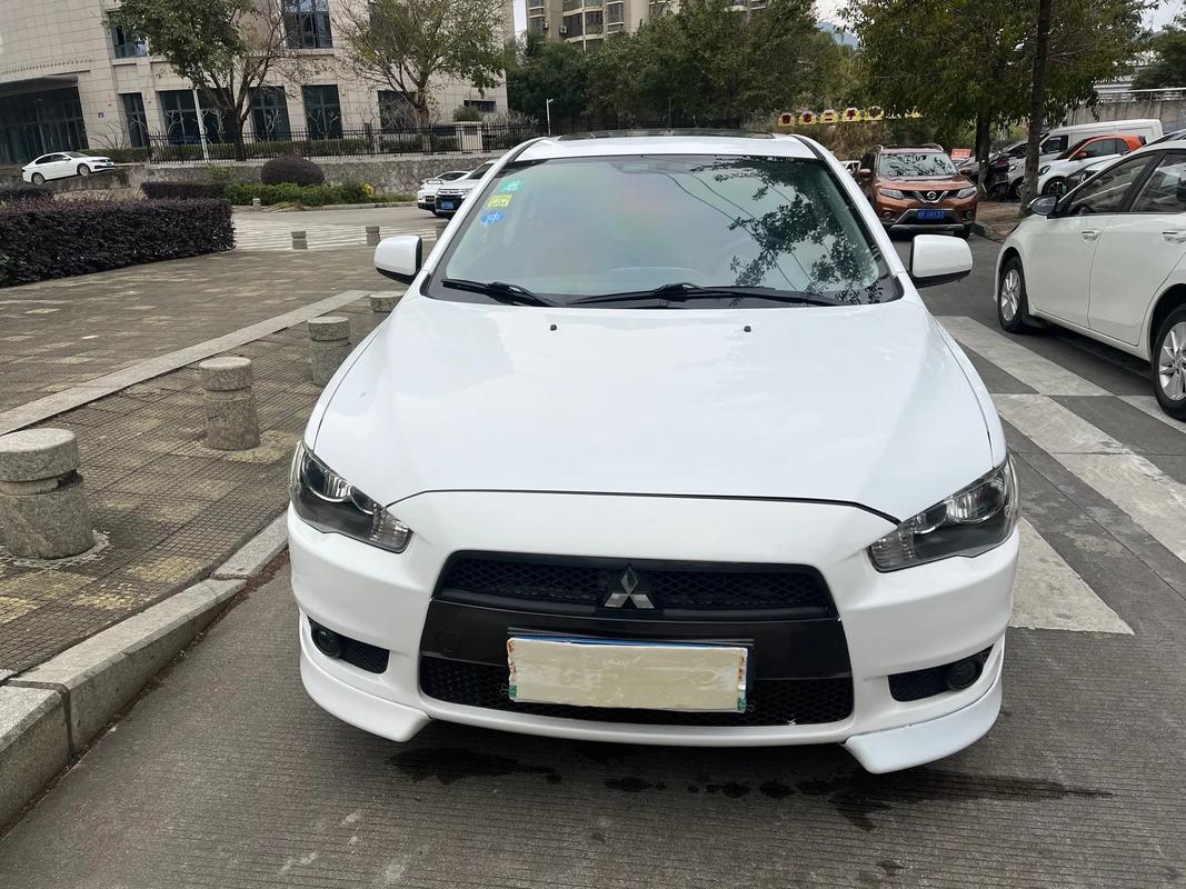 三菱翼神和evo的外观区别,三菱evox和翼神的区别